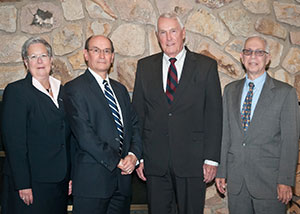 From left, Penn College President Davie Jane Gilmour; Thomas G. Poole, new board member; Robert E. Dunham, retiring board chairman; and Robert A. Secor, new board chairman.