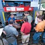 Christopher J. Gagliano, program manager of the Thermoforming Center of Excellence, demonstrates the process for participants. Christopher J. Gagliano, program manager of the Thermoforming Center of Excellence, demonstrates the process for participants.