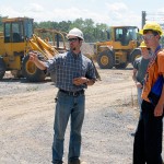With some of the college's fleet of construction vehicles as a backdrop, Seth J. Welshans, laboratory assistant for diesel equipment technology, walks the group through the riverside heavy equipment training site. With some of the college's fleet of construction vehicles as a backdrop, Seth J. Welshans, laboratory assistant for diesel equipment technology, walks the group through the riverside heavy equipment training site.