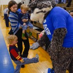 The Wildcat also joins the crew of blue, acknowledging a young fan showing off his new sneakers. The Wildcat also joins the crew of blue, acknowledging a young fan showing off his new sneakers.