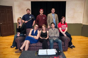 The cast of "Love, Sex, and the I.R.S." prepares to entertain its campus audience. Back row, from left: Max M. Rosen, John V. Catania and Scott T. Stofko. On sofa, from left: Eileen Harrington, Clayton K. Lose, Rachelle N. Horning, Jacob A. Urey and Jessie M. Chronister.