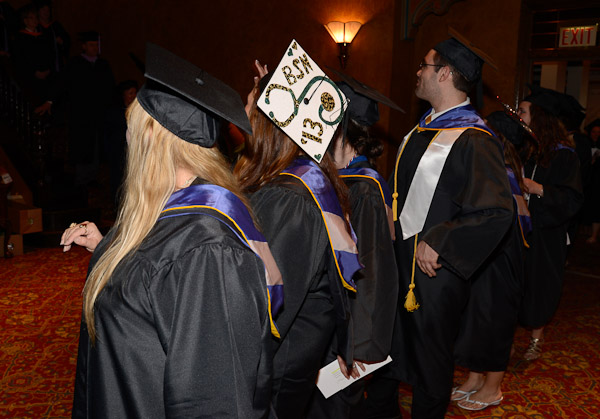 A nursing grad adds a personal touch to her graduation garb.