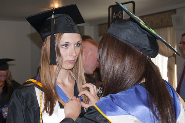 A little help from a friend in graduation preparations