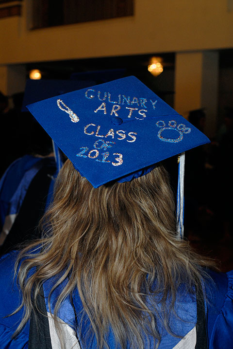 Added ingredients enhance the mortarboard of Jessica A. Reppert, a culinary arts and systems major from Northampton.