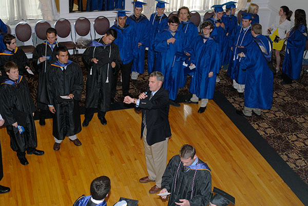 Synchronize your watches: Registrar Denny Dunkleberger apprises students of their imminent departure from The Genetti.