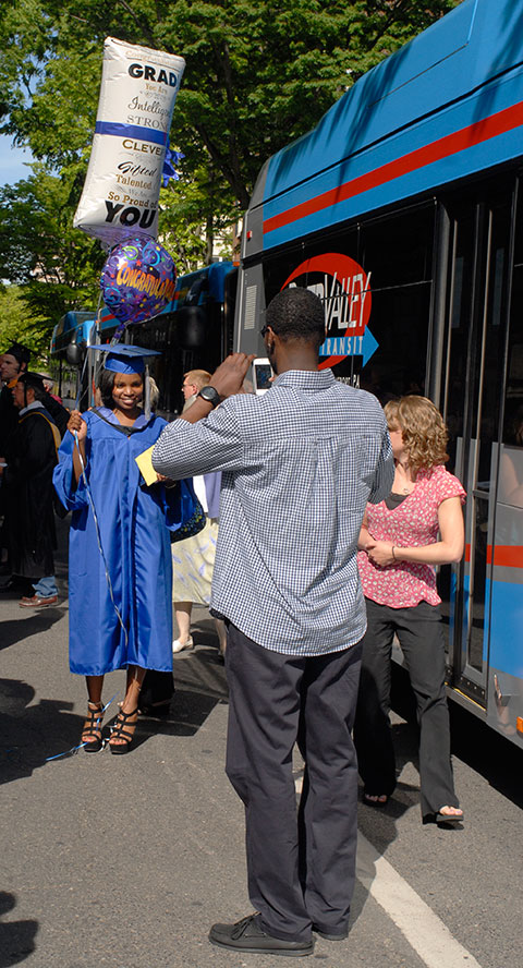 Health information technology graduate Tiffany S. Vaughn carries balloons and optimism.