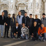 ... and pause for a group photo while seeing the sights in Milan.