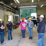 Ryan W. Peck, instructor of diesel equipment technology, prepares his guests for operation of heavy construction equipment.