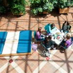 Even those who stayed indoors, like these patrons of the Breuder Advanced Technology and Health Sciences Center atrium, basked in the warmth of imminent summer. Even those who stayed indoors, like these patrons of the Breuder Advanced Technology and Health Sciences Center atrium, basked in the warmth of imminent summer.