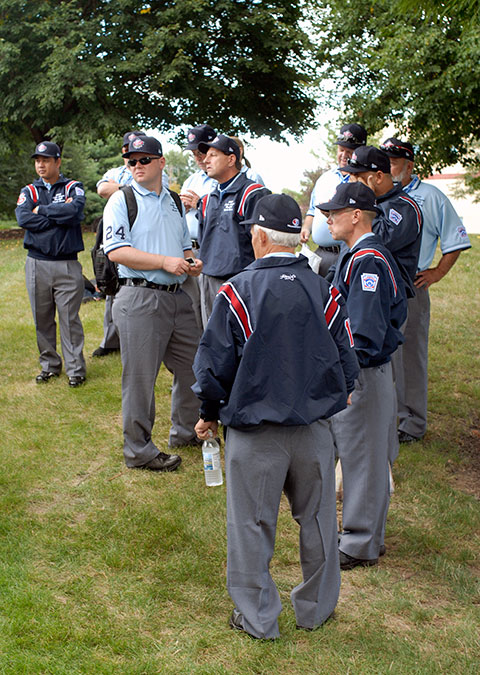 This year's Series umpires congregate on the Bush Campus Center hill before moving to the parade staging area.