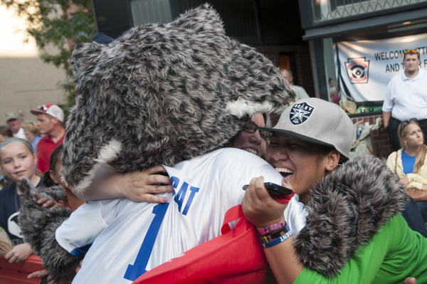 The Wildcat accepts hugs from its fans.