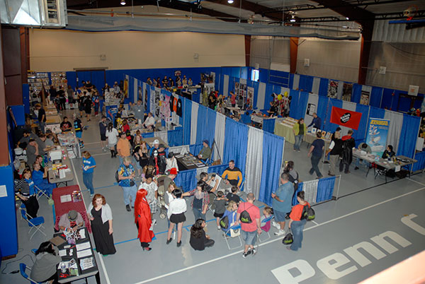 Comic Con attendees, vendors and artists fill the Field House floor.