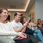 OCHO executive board members (from left) Whitnie-Rae Mays, Justin E. Eberhart and Jessica R. Wiegand enjoy the show with co-sponsors Kas A. Williams, residence life coordinator (second from right), and Katie L. Mackey, coordinator of off-campus living and commuter services.