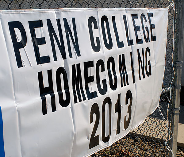 Sign welcomes soccer fans to campus celebration.