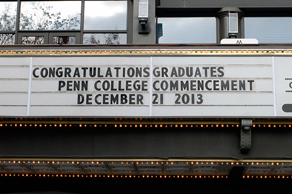 The Arts Center marquee offers congratulations in addition to shelter.