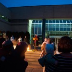 With SGA President Michael L. Spear and Student Activities' Malinda C. Love to her immediate right, Penn College President Davie Jane Gilmour shares the glow of the season.