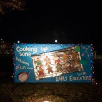 Light reflects off a foil cookie sheet on the Early Educators' entry, which won first prize among student organizations.