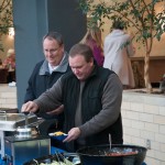 Eric D. Ranck, manager of bursar and payroll services (left), joins Carl J. Bower Jr., horticulture instructor, in the buffet line.