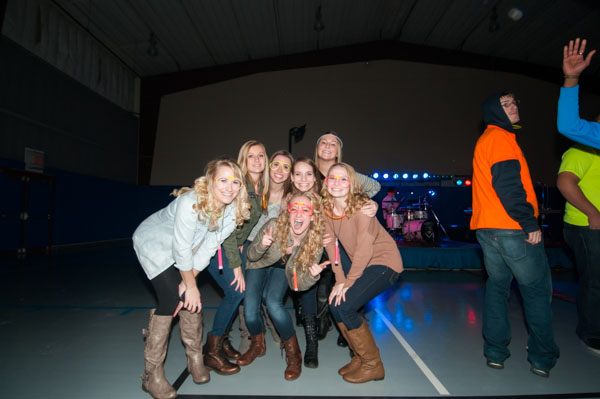 Participants don glow-in-the-dark glasses and other illuminating evening wear.