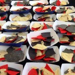 Echoing colors from the college's centennial logo, tinted tortilla chips await.