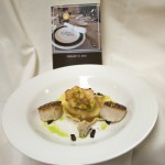 The fourth course, New England “Chowder,” included pan-seared diver sea scallops, potato and pork ravioli, bacon lardoons, pickled celery, chive oil and celeriac chips, and was finished with clam cream.