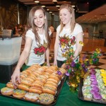 Mix-Off contestants Tiffany A. Edwards, a culinary arts technology major from Athens (left), and Alivia L. Bollock. a hospitality management student from Gaines, sample the Mardi Gras treats before the mock cocktail competition.
