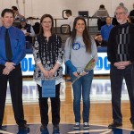 Alison K. Van Matter is joined at midcourt by her parents and coach Matt Wilt (left) ...