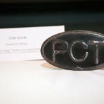 A Penn College tow hook, fabricated by campus welders, awaits bidders.