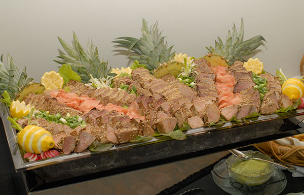 Beautifully arrayed and colorfully accented, sesame tuna tempts reception-goers.