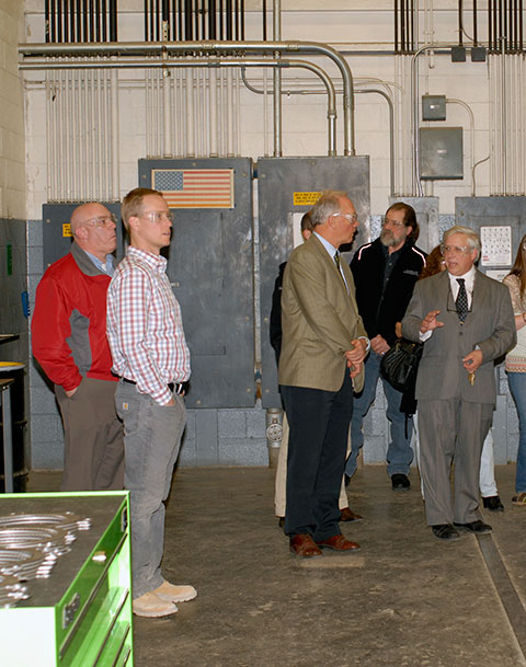 Colin W. Williamson, dean of transportation and natural resources technologies, leads an ESC tour.