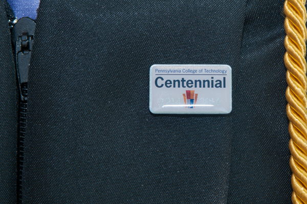 A special Centennial year keepsake pin was given to all graduates to wear on their gowns. 