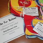 Early Educators Club provides "Bibs for Babies."