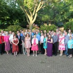 Program graduates gather on the PDC patio for a reunion memento.