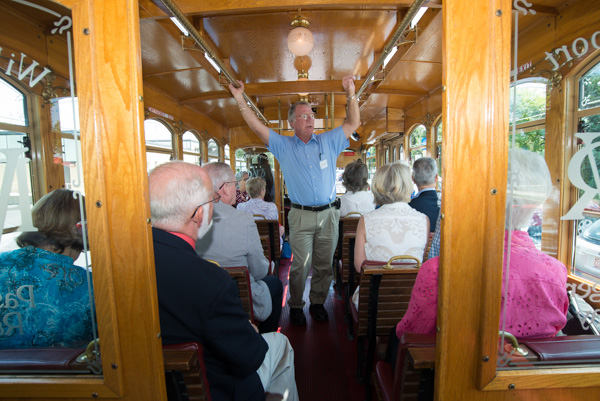 William J. Martin, senior vice president from 1983-2011, leads one of two postlunch tours aboard a River Valley Transit trolley.