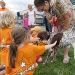 A contestant obliges some hands-on attention ...