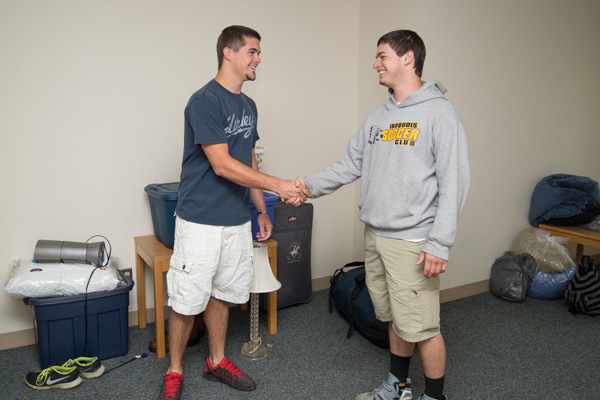 … while, in the same room, freshman roommates enrolled in automotive technology: Honda PACT emphasis – Dylan C. Hurrey, left, of East Greenville, and Joseph M. Brown, from Erie –  meet for the first time. 