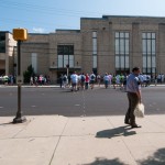 Teams scatter across West Third Street to begin their scavenger hunt under the vigilant eye of Patrick McCabe, coordinator of admissions/enrollment event services.