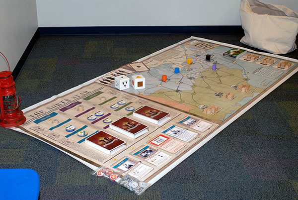... and demonstrated a 32-square-foot version of his award-winning board game, 