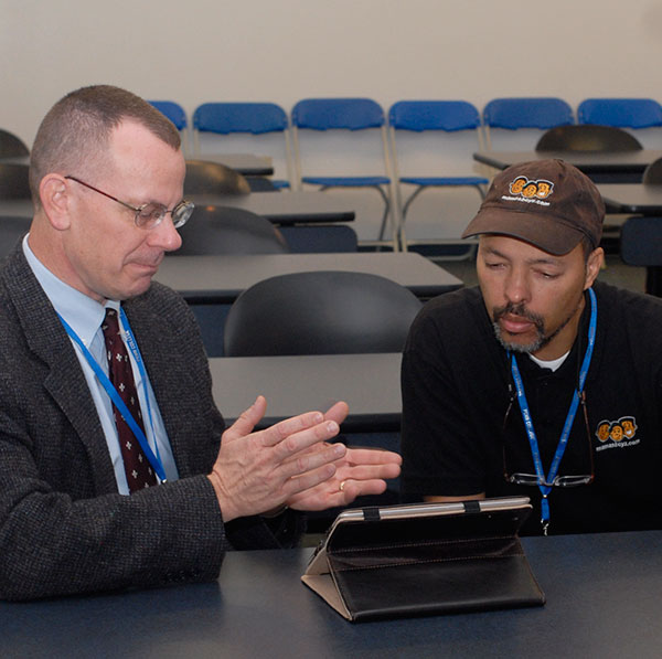 Presenters say the Penn College event gives them something they don't get just anywhere: the opportunity to swap knowledge with one another. Williamsport Area High School teacher and perennial WCC booster John Weaver (left) talks with Jerry Craft about 