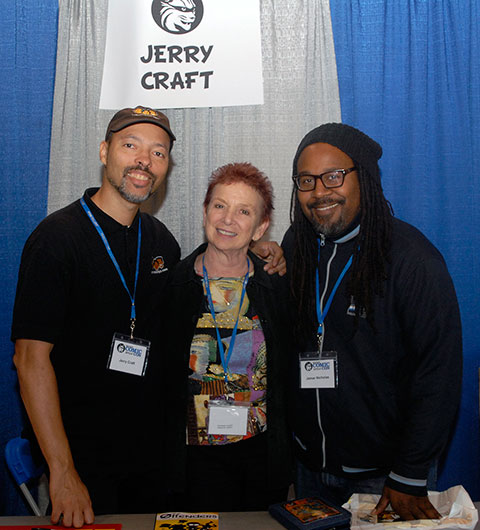 Veteran Wildcat Comic Con presenters welcome their keynoter colleague; from left are Jerry Craft, Barbara Slate and Jamar Nicholas.