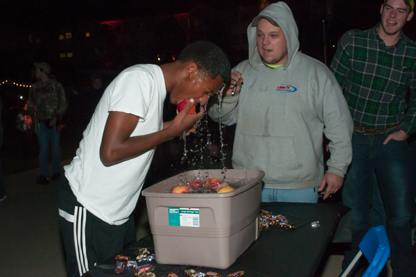 A refreshing dunk for an apple