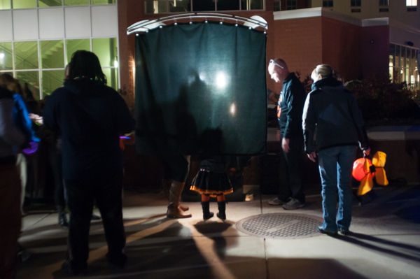 What light through yonder curtain breaks? (It's a photo booth, more fun than fearsome.)