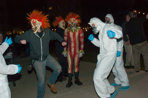 Hazmat suits and clown wigs ...