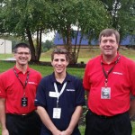 Colby M. Tuff joins his former Penn College Honda PACT instructors, Joseph A. Tavani (left) and Charles F. Probst, who assisted corporate representatives with judging at the Acura Top Tech competition.