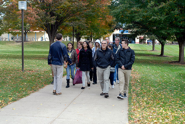 Presidential Student Ambassador Kyle D. Bomboy leads a tour westward from the Bush Campus Center.
