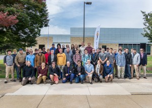 Students and employees involved with “Student Bodies,” a Centennial art installation project at Penn College, gather for a photo with President Davie Jane Gilmour (third from left, back row) and Michael K. Patterson, lead designer/artist and welding instructor (fourth from left, front row).