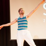 Caleb G. Schirmer performs a dance piece between acts.