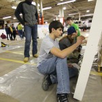 Surrounded by moral support, web and interactive media majors Robert L. Sloss, of Lake Harmony, and Brittany R. Terpstra, of Jim Thorpe, toil on behalf of the Wildcat Events Board.
