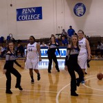 ... while the Wildcat women join the dance team's performance.