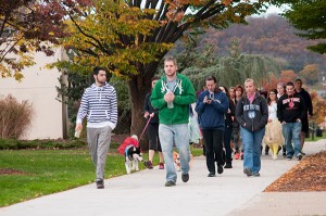 : Participants loop Penn College’s Susquehanna Street walking mall during a student-organized walkathon that raised money for the I’m Able Foundation and to help occupational therapy assistant students pay for professional credentialing fees.